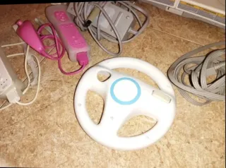 Nintendo Wii con mandos y juegos