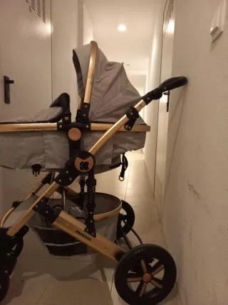 Carro de bebé Kikka boo gris y dorado