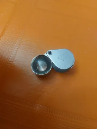 Lupa antigua plegable