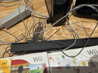 Consola Wii U con mandos y varios juegos y karaoke