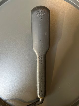 Planchas de pelo GHD negras y doradas