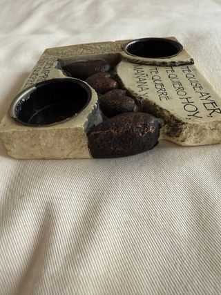 Portacandele in pietra con frase