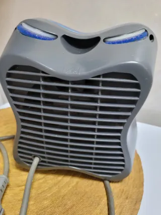 Estufa de aire azul y gris