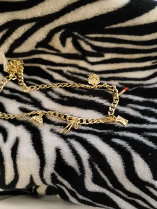 Collar H&M Dorado con charms