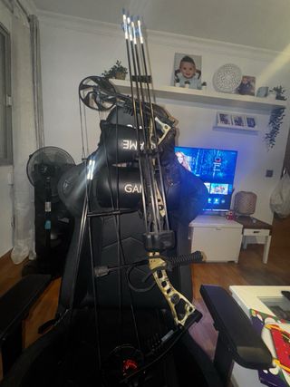 Arco de poleas con flechas y protector