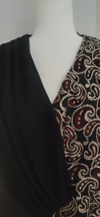 Blusón fiesta negro y multicolor.