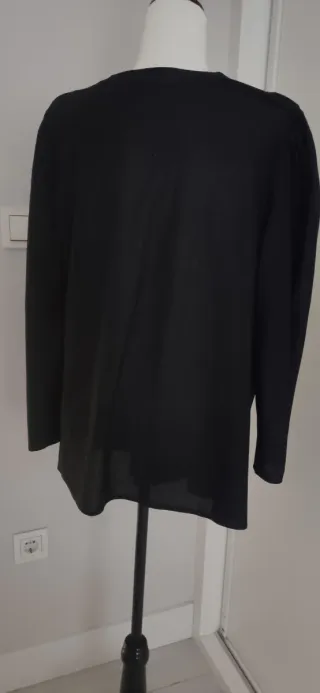 Blusón fiesta negro y multicolor.