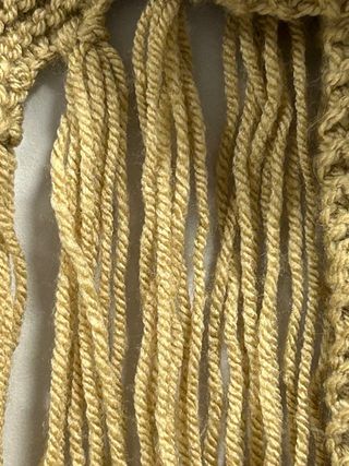 Bufanda tejida color beige