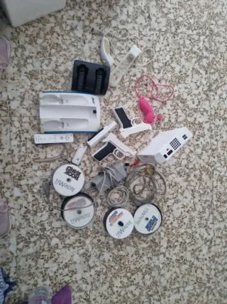 Consola Wii con mandos y juegos