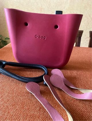 Borsa O bag fucsia con manici di vario tipo