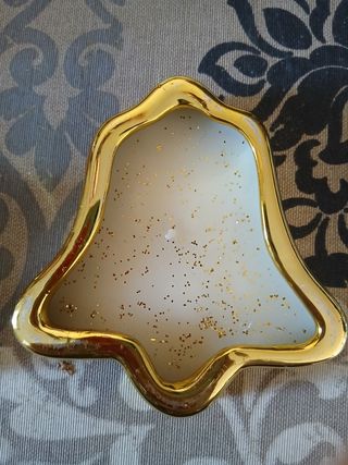 Due portacandele con forma di campana e stella