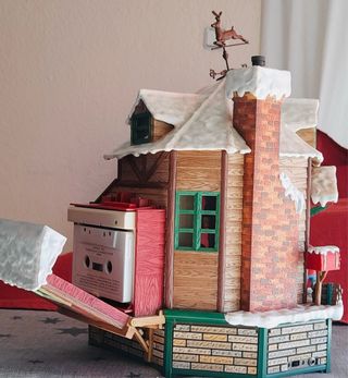 Casa de Papa Noel con música y movimiento