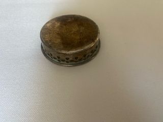 Peça decorativa antiga com detalhes vazados