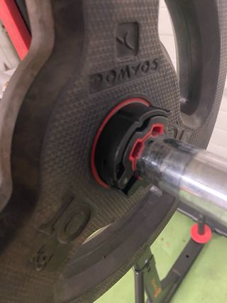 Rack Domyos 100 con barra y pesas