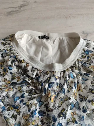 Falda Tex Talla 13/14. Mariposas