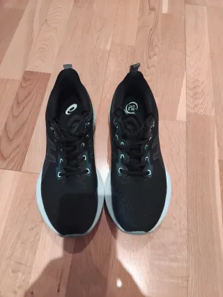 ASICS Novablast 4 Zapatillas Running Negro Amarill