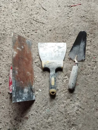 Conjunto de paletas de albañil