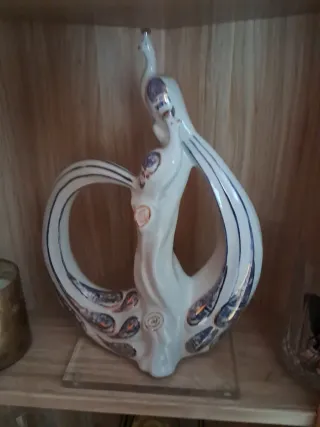 Figura de porcelana pavos reales