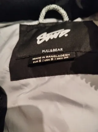 Chaleco plumífero hombre negro y gris