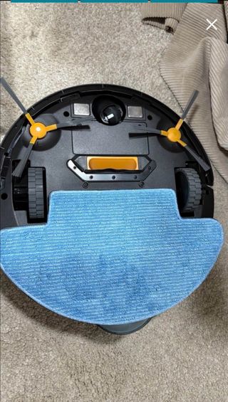 Robot aspirador blanco