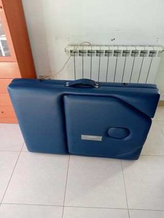 Camilla masajes, libro y láminas.