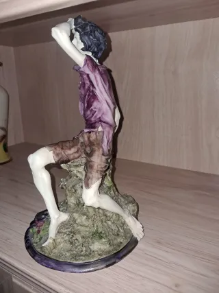 Figura decorativa agricultor con hoz