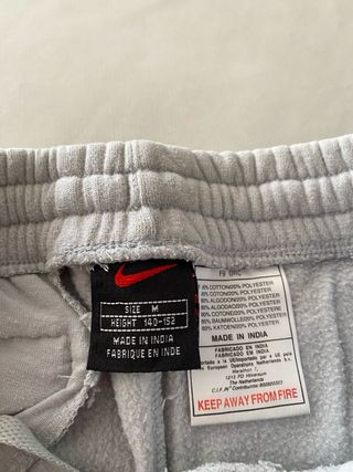 Pantalón chándal Nike beige niño