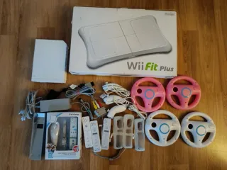 Nintendo Wii + Wii Fit Plus + Accesorios