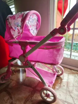 Carrito de muñecas rosa