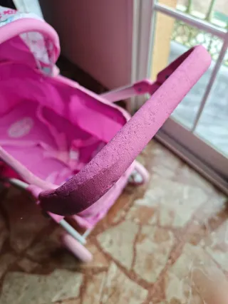 Carrito de muñecas rosa