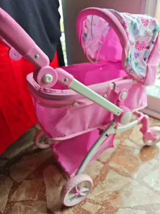 Carrito de muñecas rosa