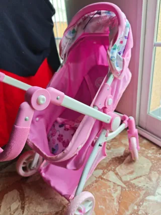 Carrito de muñecas rosa