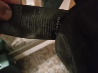 Abrigo negro con capucha y pelo