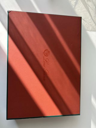 Scatola e sacchetto Loro Piana rossi