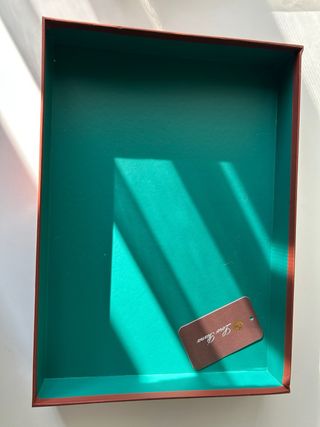 Scatola e sacchetto Loro Piana rossi