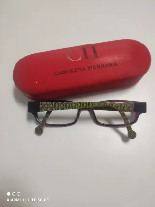 Gafas Carolina Herrera Morado y Dorado