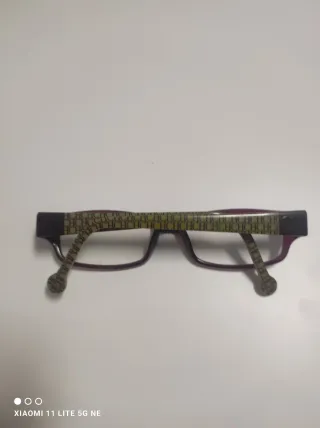 Gafas Carolina Herrera Morado y Dorado