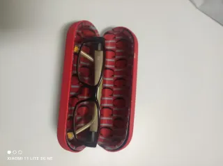 Gafas Carolina Herrera Morado y Dorado