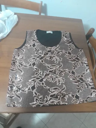 Top con paillettes oro e nero