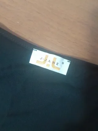 Top con paillettes oro e nero