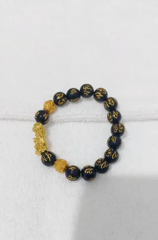 Pulsera Feng Shui Negra y Dorada