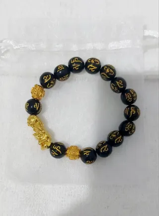 Pulsera Feng Shui Negra y Dorada