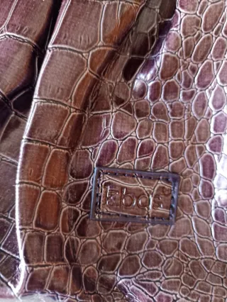 Bolso cartera morado Kbas con espejo