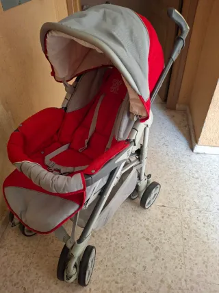 Carrito de bebé y colchoneta nueva