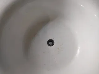 Palanganero antiguo con espejo y mármol