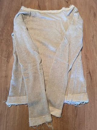 Jersei lleuger beix amb cremallera i estrella