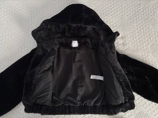 Cazadora efecto pelo con capucha