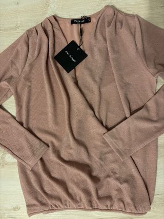 Maglia Artigli S rosa brillantinosa. Scollo ampio.