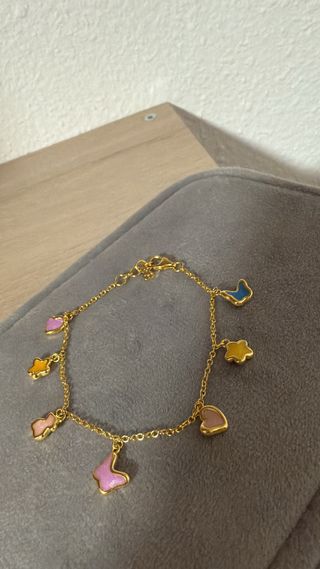 Pulsera Tous Dorada con Dijes de Colores