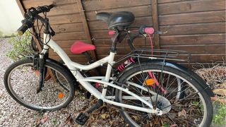 Bicicleta infantil rosa y negra